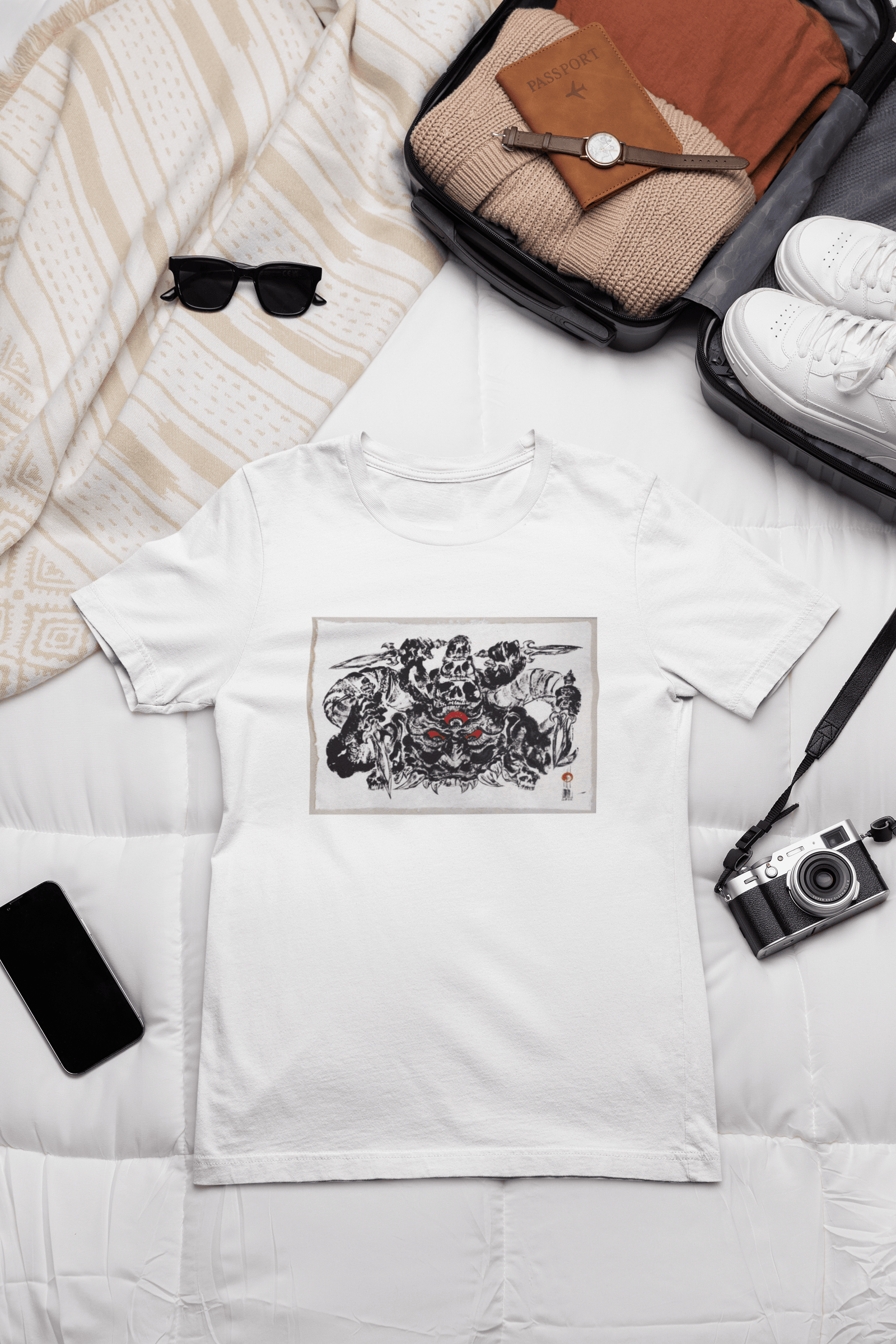 outfit-mockup-of-a-bella-canvas-t-shirt-placed-on-a-bed-next-to-a-vintage-camera-m37445
